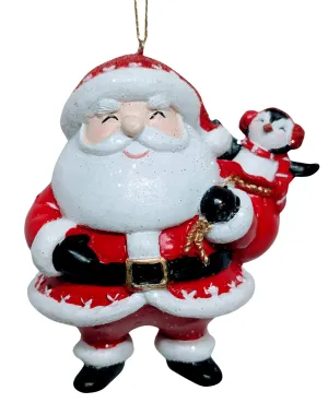 Cheerful Santa Ornament Holding a Penguin